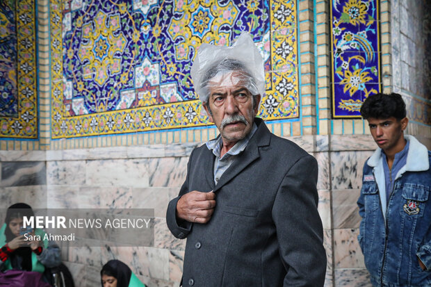 حال و هوای بارانی حرم مطهر رضوی