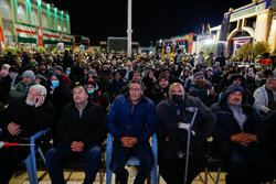 احترام نظامی زائران حاج قاسم به پرچم ایران در ساعت شهادت سردار