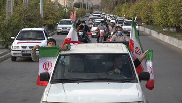 رژه خودرویی و موتوری در حاجی آباد برگزار شد