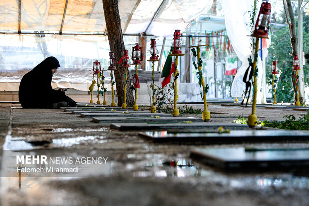 آیین غبارروبی مزار شهدا