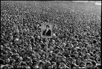 During the Iranian revolution in 1979, a portrait of its leader, Ayatollah Ruhollah Khomeini, was held above a sea of protesters.