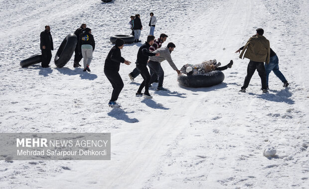 Playing in the snow in Chaharmahal and Bakhtiari Province