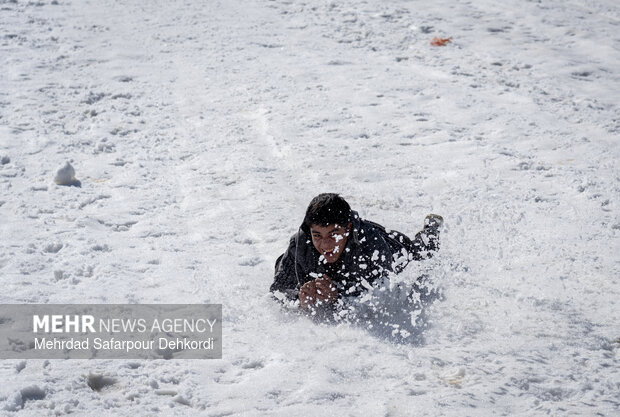 Playing in the snow in Chaharmahal and Bakhtiari Province