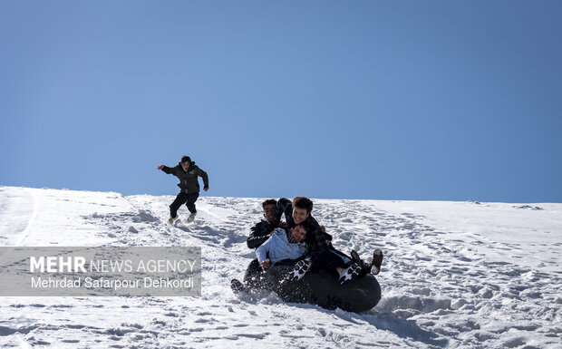 Playing in the snow in Chaharmahal and Bakhtiari Province