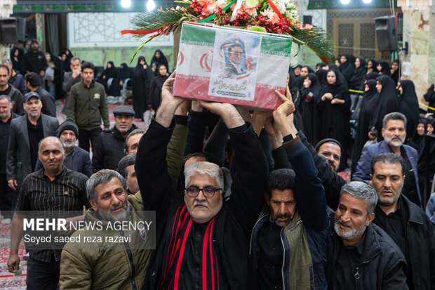 مراسم وداع با پیکر شهید علیرضا دهقانی آرانی