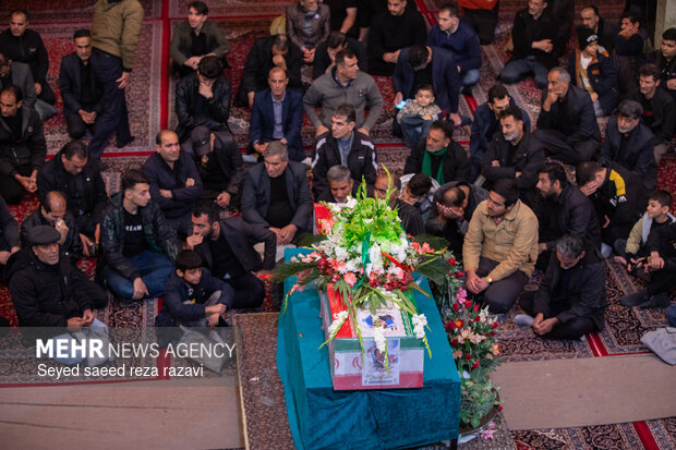 مراسم وداع با پیکر شهید علیرضا دهقانی آرانی