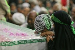 تشییع پیکر شهیده «حنانه علیزاده» در بوئین‌زهرا