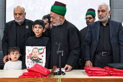 بزرگداشت خانواده شهدای جنگ رمضان در البرز