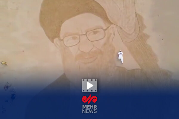 طراحی چهره رهبر شهیدمان روی شنهای ساحلی توسط طراح پاکستانی