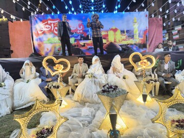 مراسم جشن عقد ۱۴ زوج در زیر بیرق امام هشتم در مشهد