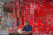 قهرمان المپیک در گلزار شهدای میناب