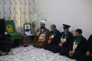 تجلیل از خانواده‌های شهدای جنگ در دشتی با حضور خدام رضوی