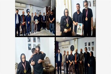 اهدای مدال ملی پوش آزادکار به خانواده شهید جنگ رمضان