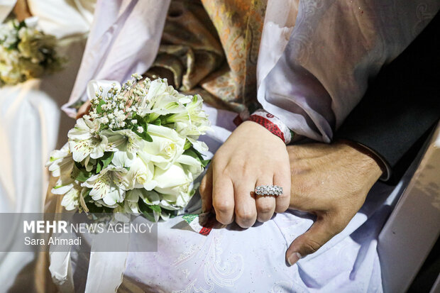 مراسم جشن عقد ۱۴ زوج مشهدی در شب میلاد امام رضا(ع)