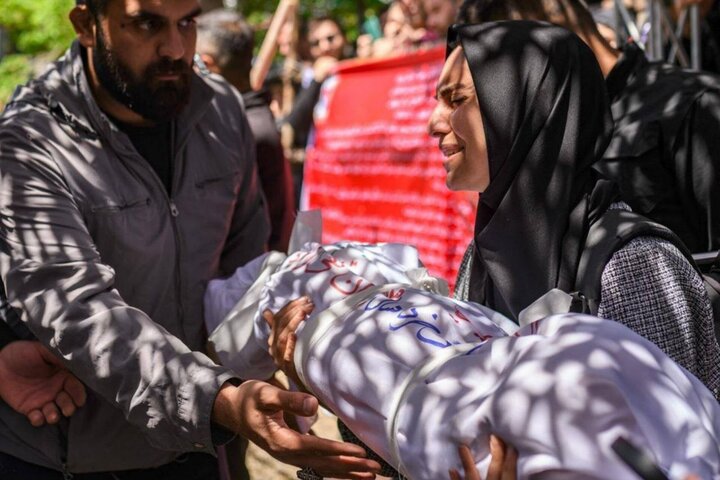 در پل B۱ برابر مرگ عکاسی کردم؛ سنگینی آخرین آغوش کودک یکساله