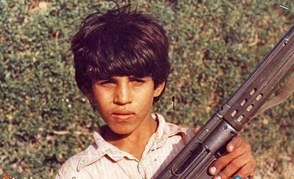 کدام شهید اولین بار از پرچم ایران کفن ساخت؟