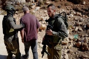 VIDEO: Israeli settler blindfolds a Palestinian farmer