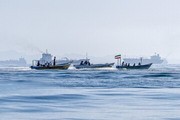 The body of Zeyd Mahigir Larki, a fisherman killed in US and Israeli strikes on fishing boats in the Strait of Hormuz, is being taken for burial on Larak Island on Sunday, May 24, 2026.