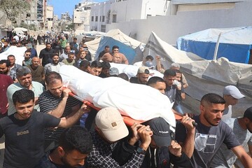 تشییع پیکر فرمانده ارشد قسام و خانواده‌اش در غزه