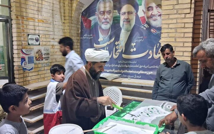 آیین سنتی پرچم نویسی در آبدان برگزار شد