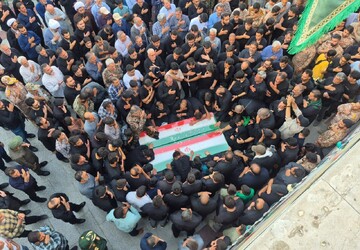 پیکر دو شهید جنگ رمضان در قم تشییع شد