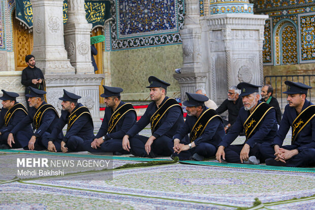 برافراشتن پرچم حرم سیدالشهدا(ع) بر فراز گنبد حرم حضرت معصومه (س)