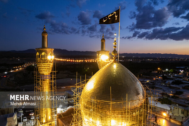 آیین تعویض پرچم گنبد حسینیه اعظم زنجان