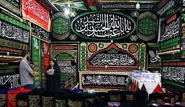پرچم‌هایی به رنگ ارادت؛ بازخوانی هنرِ عزاداری در کوچه و بازار اصفهان
