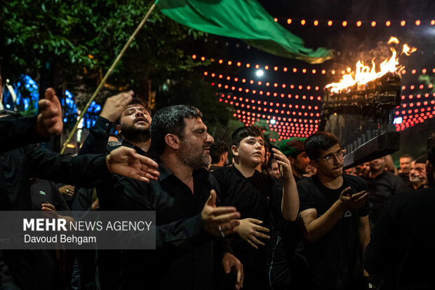 آیین‌ مشعل گردانی نجفی های مقیم مشهد