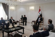 وزير الخارجية الإيراني يلتقي رئيس مجلس النواب العراقي