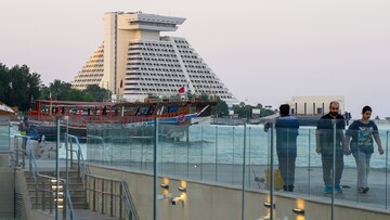 People walk along the Corniche area in Doha, Qatar, on June 29, 2026