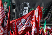 Red flags as symbols of revenge for Leader's blood