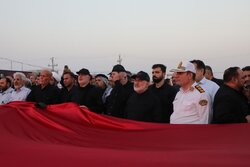 مراسم اهتزاز پرچم عزای حسینی در مرز شلمچه برگزار شد
