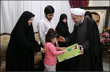 Rouhani visits family of martyred nuclear scientist