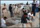 کربلا کے نزدیک دو کار بم دھماکوں میں کم از کم بیس افراد جاں بحق ہوگئے ہیں
