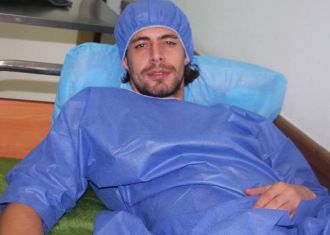 Ferydoon Zandi undergoes surgery